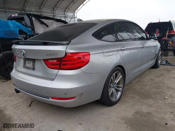 2016 BMW 3 Series Gran Turismo 328i xDrive with VIN WBA8Z5C59GG501996, listed as a IAAI auction lot 41238964 with 71,542 mi miles. Bid and sale history available at carsss.com. Image 4.