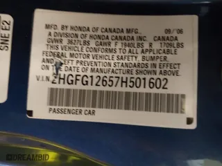 2007 Honda Civic Cpe LX with VIN 2HGFG12657H501602, listed as a IAAI auction lot 41715412 with 164,141 mi miles. Bid and sale history available at carsss.com. Image 9.