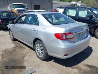 2012 Toyota Corolla L with VIN 2T1BU4EEXCC818354, listed as a IAAI auction lot 42129695 with 216,307 mi miles. Bid and sale history available at carsss.com. Image 3.