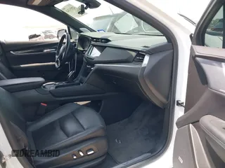 2021 Cadillac XT5 FWD Premium Luxury z VIN 1GYKNCR42MZ174309, wystawiony jako IAAI lot #42051341 z przebiegiem 75 544 mil mil oraz . Historia ofert i sprzedaży dostępna na DreamBid. Obrazek 5.
