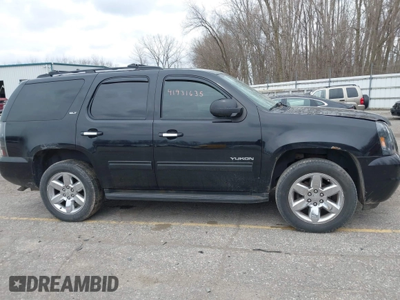 2011 GMC Yukon SLT with VIN 1GKS2CE01BR347675, listed as a IAAI auction lot 41931635 with 247,817 mi miles. Bid and sale history available at carsss.com. Image 13.