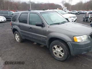 2002 Ford Escape XLT Choice with VIN 1FMYU04122KC36937, listed as a IAAI auction lot 42014887 with 141,885 mi miles. Bid and sale history available at carsss.com. Image 6.