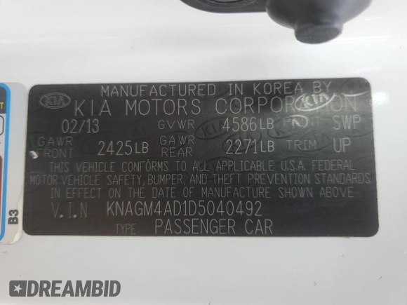 2013 Kia Optima LX with VIN KNAGM4AD1D5040492, listed as a Copart auction lot 77559034 with Not Provided miles and Salvage Title. Bid and sale history available at DreamBid. Image 12.