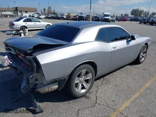 2017 Dodge Challenger SXT Plus with VIN 2C3CDZAG5HH502354, listed as a IAAI auction lot 41740550 with 131,860 mi miles. Bid and sale history available at carsss.com. Image 4.