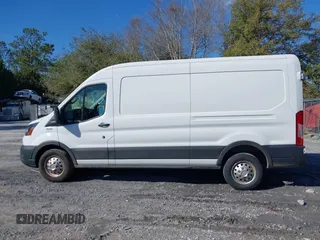 2023 Ford Transit Cargo with VIN 1FTBR2C8XPKA33372, listed as a IAAI auction lot 41735299 with 56,777 mi miles and . Bid and sale history available at DreamBid. Image 14.