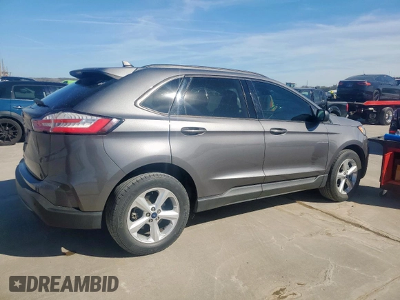 2021 Ford Edge SE z VIN 2FMPK3G94MBA46090, wystawiony jako Copart lot #49350915 z przebiegiem 99 324 mil mil oraz Czysty tytuł • Clean title. Historia ofert i sprzedaży dostępna na DreamBid. Obrazek 3.