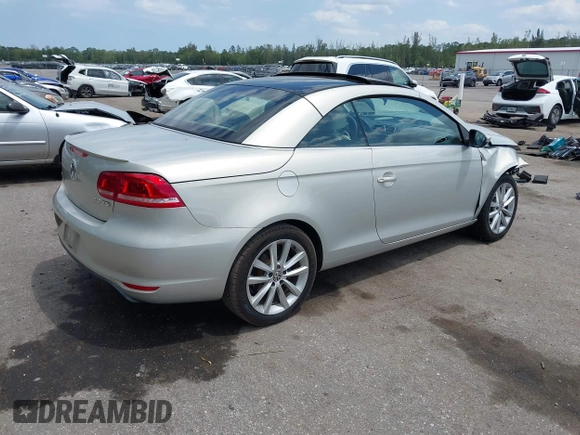 2012 Volkswagen Eos Komfort with VIN WVWBW7AHXCV006075, listed as a IAAI auction lot 42054520 with 104,037 mi miles and . Bid and sale history available at DreamBid. Image 4.