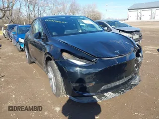 2024 Tesla Model Y with VIN 7SAYGDED5RF093018, listed as a IAAI auction lot 41747467 with 60,469 mi miles and . Bid and sale history available at DreamBid. Image 1.