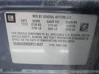 2013 Buick LaCrosse with VIN 1G4GA5ER8DF214507, listed as a IAAI auction lot 41939876 with 137,066 mi miles. Bid and sale history available at carsss.com. Image 9.