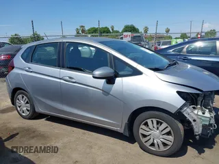 2017 Honda Fit LX with VIN JHMGK5H51HS023212, listed as a IAAI auction lot 42153107 with 106,778 mi miles. Bid and sale history available at carsss.com. Image 14.