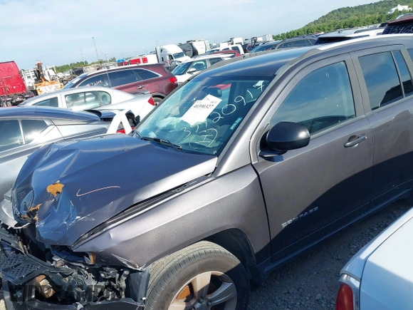 2016 Jeep Compass Sport with VIN 1C4NJDBB0GD511414, listed as a IAAI auction lot 40390327 with 132,120 mi miles. Bid and sale history available at carsss.com. Image 2.