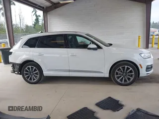 2017 Audi Q7 Premium with VIN WA1AAAF74HD006104, listed as a IAAI auction lot 42554741 with 95,276 mi miles and . Bid and sale history available at DreamBid. Image 14.
