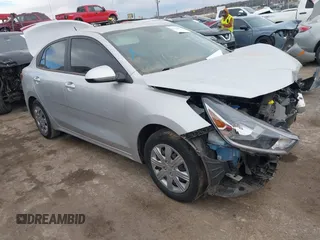 2023 Kia Rio S z VIN 3KPA24AD5PE528576, wystawiony jako IAAI lot #41351601 z przebiegiem 35 147 mil mil oraz . Historia ofert i sprzedaży dostępna na DreamBid. Obrazek 1.