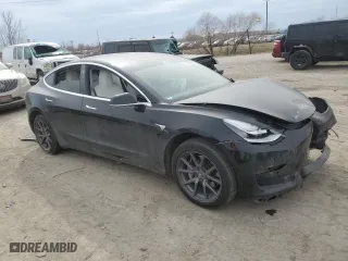 2020 Tesla Model 3 Standard Range Plus with VIN 5YJ3E1EA4LF662014, listed as a Copart auction lot 47608985 with 0 mi miles and Salvage Title. Bid and sale history available at carsss.com. Image 4.