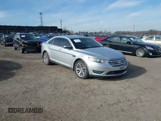 2014 Ford Taurus Limited with VIN 1FAHP2F86EG134779, listed as a IAAI auction lot 41660527 with 115,016 mi miles. Bid and sale history available at carsss.com. Image 1.