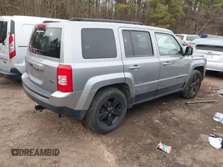 2015 Jeep Patriot Altitude Edition with VIN 1C4NJPBA8FD399095, listed as a IAAI auction lot 41236068 with 119,298 mi miles. Bid and sale history available at carsss.com. Image 4.