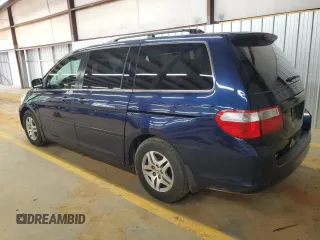 2005 Honda Odyssey EX-L with VIN 5FNRL38785B054186, listed as a Copart auction lot 58072125 with 219,928 mi miles and Salvage title. Bid and sale history available at DreamBid. Image 2.
