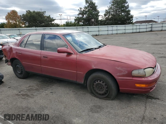 1993 Toyota Camry LE with VIN 4T1SK12E8PU240803, listed as a Copart auction lot 76663004 with 214,911 mi miles and Salvage Title. Bid and sale history available at carsss.com. Image 4.