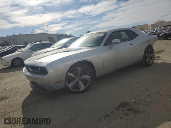 2010 Dodge Challenger SRT-8 with VIN 2B3CJ7DW4AH318204, listed as a Copart auction lot 86770904 with 91,830 mi miles and Salvage title. Bid and sale history available at DreamBid. Image 1.