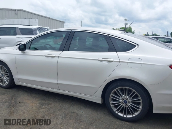 2016 Ford Fusion SE с VIN 3FA6P0HD3GR212579, выставлен на аукционе IAAI как лот 42466967 с пробегом 117 877 миль миль и . История ставок и продаж доступна на DreamBid. Изображение 14.