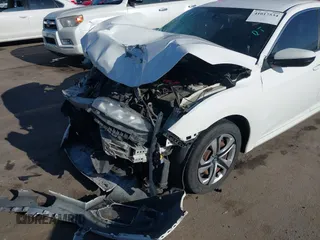 2016 Honda Civic Sedan LX with VIN 2HGFC2F58GH515190, listed as a IAAI auction lot 41017534 with 135,389 mi miles. Bid and sale history available at carsss.com. Image 5.