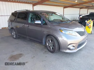 2015 Toyota Sienna SE with VIN 5TDXK3DC1FS667924, listed as a IAAI auction lot 42062805 with 123,504 mi miles. Bid and sale history available at carsss.com. Image 1.