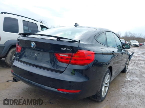 2014 BMW 3 Series 328i Gran Turismo xDrive z VIN WBA3X5C51ED558871, wystawiony jako IAAI lot #41940706 z przebiegiem 74 126 mil mil oraz . Historia ofert i sprzedaży dostępna na DreamBid. Obrazek 4.