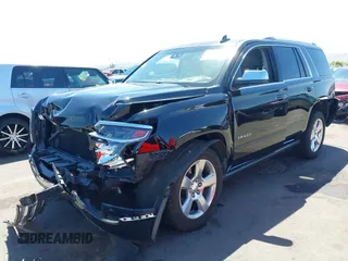 2015 Chevrolet Tahoe LTZ z VIN 1GNSKCKC7FR715512, wystawiony jako IAAI lot #42054583 z przebiegiem 106 941 mil mil oraz . Historia ofert i sprzedaży dostępna na DreamBid. Obrazek 17.