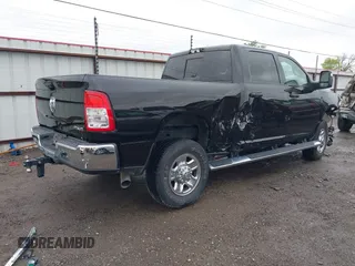 2023 Ram 2500 Tradesman z VIN 3C6UR5CL9PG593221, wystawiony jako IAAI lot #41959202 z przebiegiem 29 303 mil mil oraz . Historia ofert i sprzedaży dostępna na DreamBid. Obrazek 4.