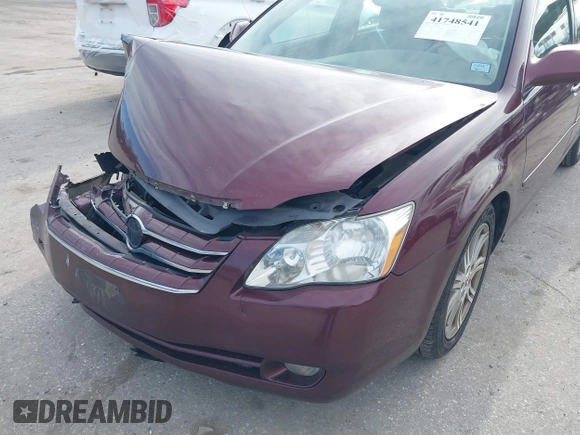 2007 Toyota Avalon XL with VIN 4T1BK36B37U173085, listed as a IAAI auction lot 41748541 with 164,021 mi miles. Bid and sale history available at carsss.com. Image 6.