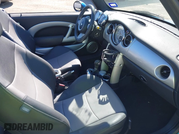 2007 MINI Convertible S with VIN WMWRH33547TL94374, listed as a IAAI auction lot 40910780 with 45,162 mi miles and . Bid and sale history available at DreamBid. Image 5.