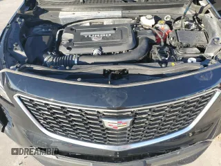 2023 Cadillac XT4 FWD Luxury z VIN 1GYAZAR42PF102696, wystawiony jako Copart lot #85540204 z przebiegiem 1 903 mil mil oraz Szkoda całkowita • Salvage title. Historia ofert i sprzedaży dostępna na DreamBid. Obrazek 12.