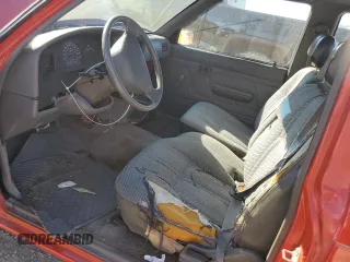 1992 Toyota Pickup DLX z VIN JT4RN93P1N5060207, wystawiony jako Copart lot #82868564 z przebiegiem 231 088 mil mil oraz Szkoda całkowita • Salvage title. Historia ofert i sprzedaży dostępna na DreamBid. Obrazek 7.