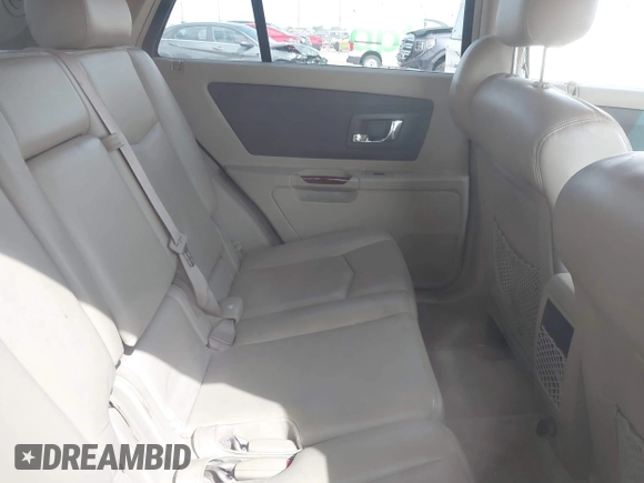 2006 Cadillac SRX z VIN 1GYEE637860206995, wystawiony jako IAAI lot #42338856 z przebiegiem 163 773 mil mil oraz . Historia ofert i sprzedaży dostępna na DreamBid. Obrazek 8.