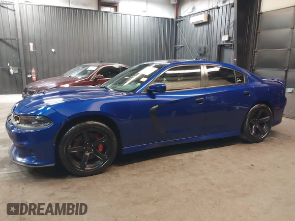 2022 Dodge Charger R/T with VIN 2C3CDXCT9NH127952, listed as a IAAI auction lot 42020401 with 55,483 mi miles and . Bid and sale history available at carsss.com. Image 15.