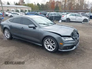 2014 Audi A7 Prestige with VIN WAU2GBFC7EN072886, listed as a IAAI auction lot 40877469 with 153,229 mi miles and . Bid and sale history available at DreamBid. Image 1.