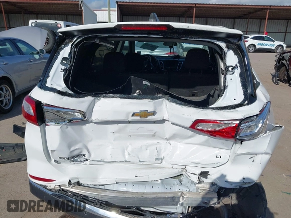 2021 Chevrolet Equinox LT with VIN 3GNAXKEV1ML351581, listed as a IAAI auction lot 41764202 with 71,547 mi miles and . Bid and sale history available at DreamBid. Image 16.