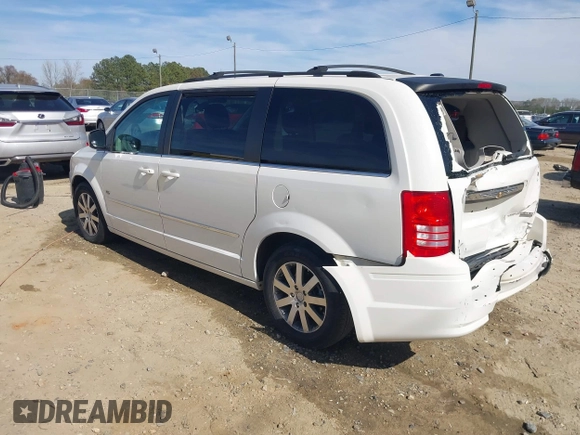 2009 Chrysler Town & Country Touring with VIN 2A8HR54X89R642118, listed as a IAAI auction lot 41844247 with 161,651 mi miles and . Bid and sale history available at DreamBid. Image 3.