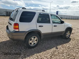 2005 Ford Escape XLT with VIN 1FMYU93145KA28777, listed as a Copart auction lot 58013995 with 94,308 mi miles and Clean title. Bid and sale history available at DreamBid. Image 3.