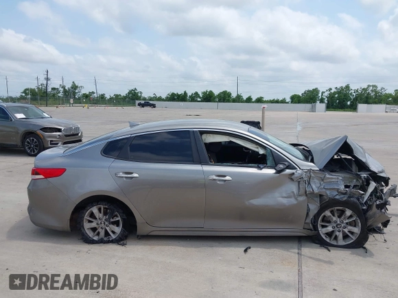 2018 Kia Optima LX with VIN 5XXGT4L38JG237631, listed as a IAAI auction lot 42286779 with 156,471 mi miles and . Bid and sale history available at DreamBid. Image 12.