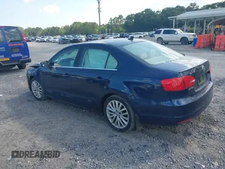 2014 Volkswagen Jetta TDI w/Premium/Nav with VIN 3VWLL7AJ3EM381929, listed as a IAAI auction lot 42539178 with 101,851 mi miles and . Bid and sale history available at DreamBid. Image 3.