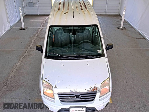 2013 Ford Transit Connect XLT z VIN NM0LS7BN2DT141131, wystawiony jako IAAI lot #42571503 z przebiegiem 151 903 mil mil oraz . Historia ofert i sprzedaży dostępna na DreamBid. Obrazek 4.