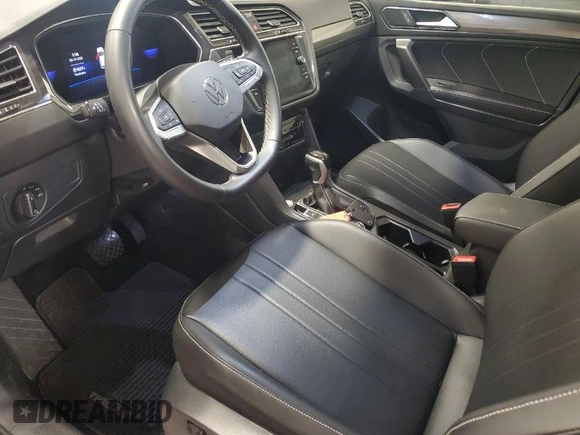 2023 Volkswagen Tiguan SE with VIN 3VV2B7AX5PM105309, listed as a IAAI auction lot 42026255 with 25,546 mi miles and . Bid and sale history available at DreamBid. Image 1.