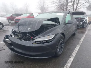 2024 Tesla Model 3 Long Range with VIN 5YJ3E1EB2RF815376, listed as a IAAI auction lot 41565549 with 10,377 mi miles and . Bid and sale history available at DreamBid. Image 2.