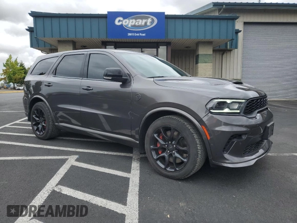 2021 Dodge Durango SRT Hellcat with VIN 1C4SDJH95MC682240, listed as a Copart auction lot 68318644 with 53,995 mi miles and Salvage Title. Bid and sale history available at DreamBid. Image 4.