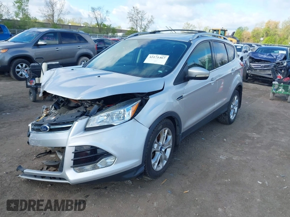 2015 Ford Escape Titanium z VIN 1FMCU9J99FUC75852, wystawiony jako IAAI lot #42171467 z przebiegiem 113 322 mil mil oraz . Historia ofert i sprzedaży dostępna na DreamBid. Obrazek 17.