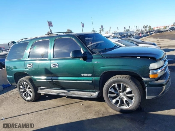 2002 Chevrolet Tahoe LS with VIN 1GNEC13T12R134174, listed as a IAAI auction lot 41233999 with 235,892 mi miles. Bid and sale history available at carsss.com. Image 13.