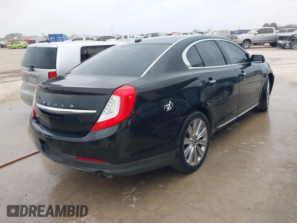 2013 Lincoln MKS EcoBoost with VIN 1LNHL9FT2DG604724, listed as a IAAI auction lot 41428420 with 152,880 mi miles and . Bid and sale history available at DreamBid. Image 4.