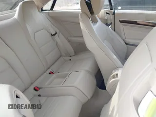 2015 Mercedes-Benz E-Class E 400 with VIN WDDKJ6FB4FF307393, listed as a IAAI auction lot 41775634 with 100,928 mi miles. Bid and sale history available at carsss.com. Image 8.