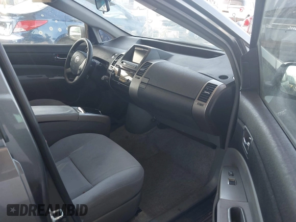 2007 Toyota Prius z VIN JTDKB20U873226409, wystawiony jako IAAI lot #42541909 z przebiegiem 128 374 mil mil oraz . Historia ofert i sprzedaży dostępna na DreamBid. Obrazek 5.